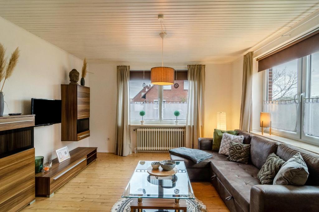 Μια τηλεόραση ή/και κέντρο ψυχαγωγίας στο Ferienhaus Diekster - Erdgeschoss 1