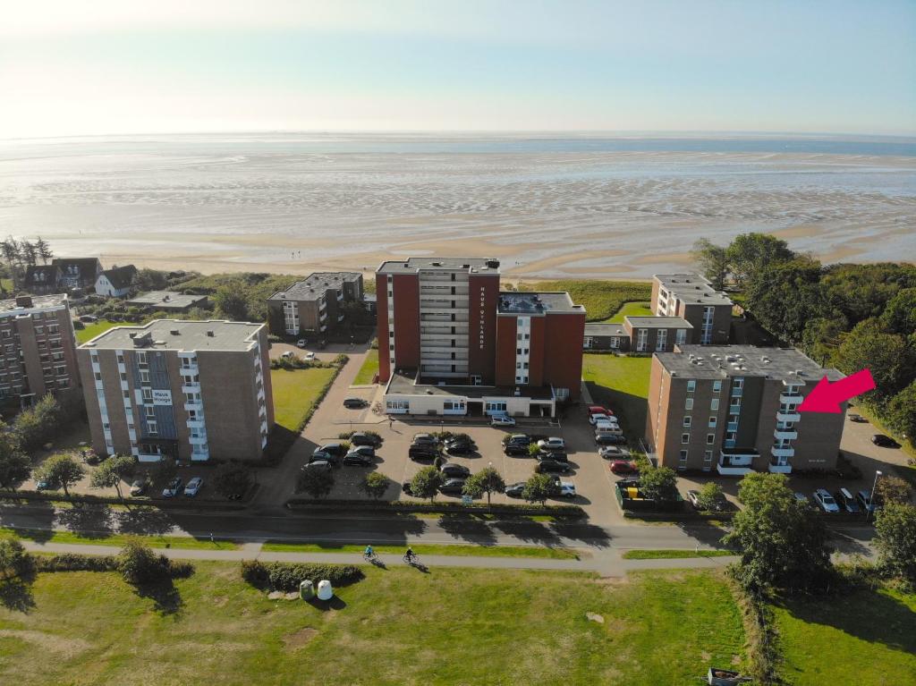 an aerial view of a building next to the beach at Haus Oland Wohnung 20 in Wyk auf Föhr