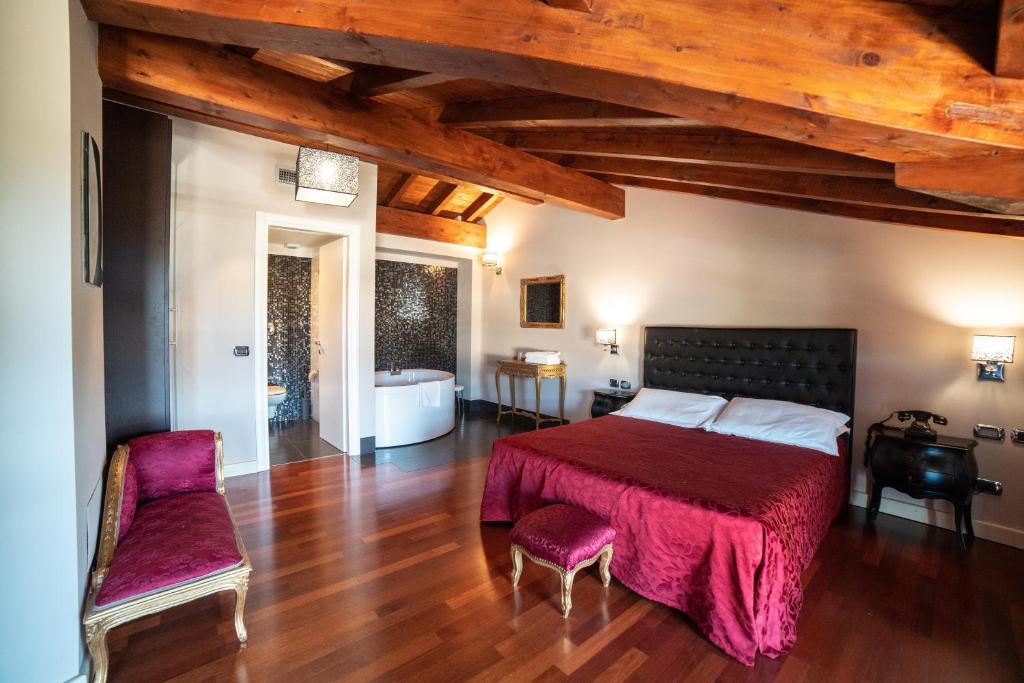 Postel nebo postele na pokoji v ubytování Hotel Residence Montelago