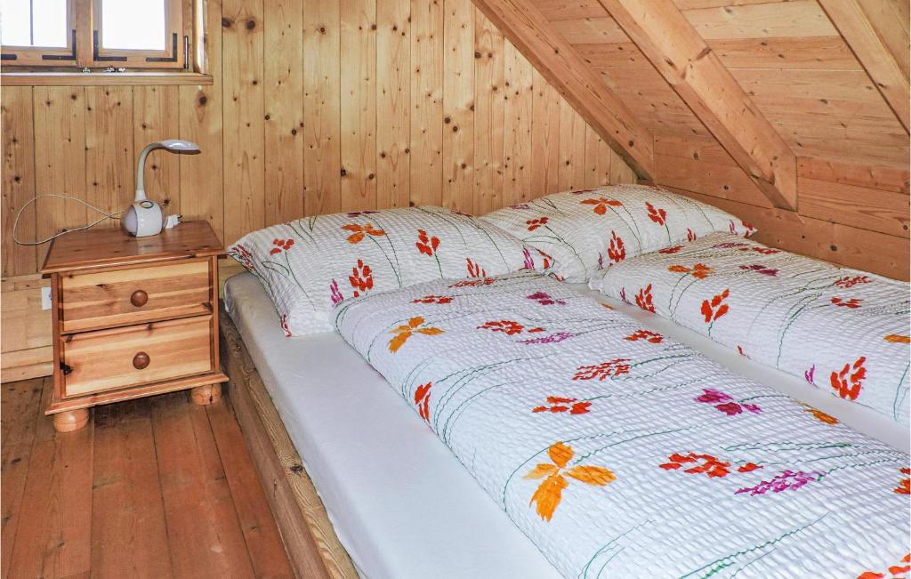 Posteľ alebo postele v izbe v ubytovaní Ferienhaus Mit Pool Und Sauna