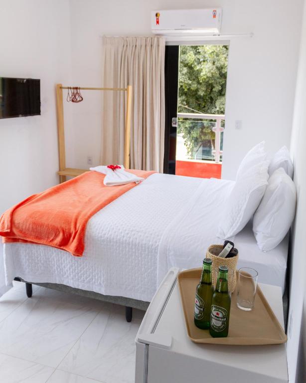 Postel nebo postele na pokoji v ubytování Residencial Santa Fé