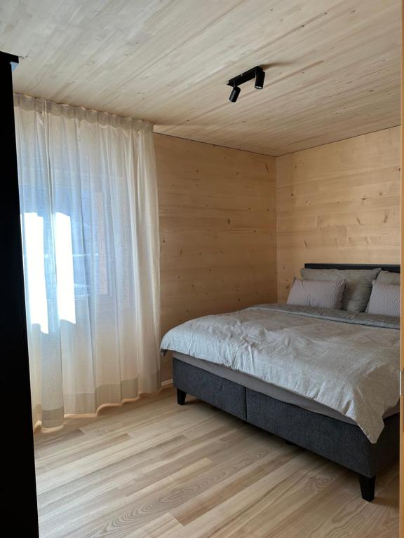 Postel nebo postele na pokoji v ubytování Mondholz Ferienwohnung