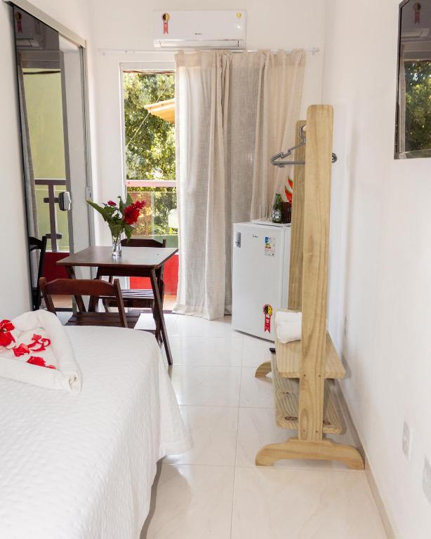 Postel nebo postele na pokoji v ubytování Residencial Santa Fé