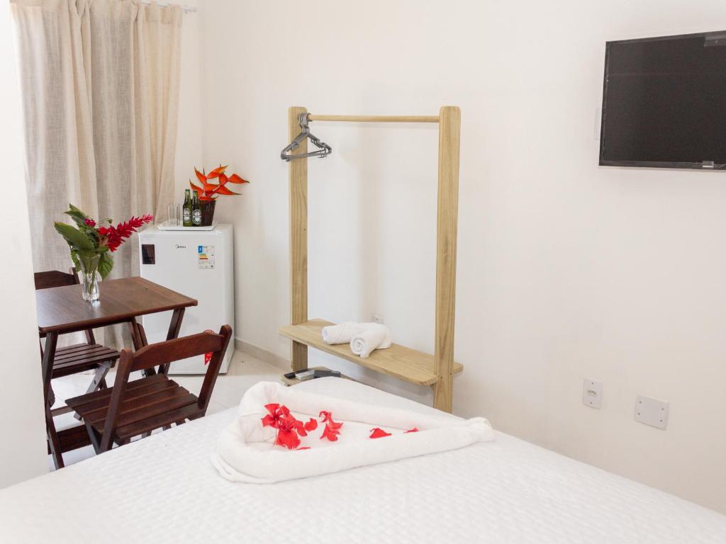 Postel nebo postele na pokoji v ubytování Residencial Santa Fé