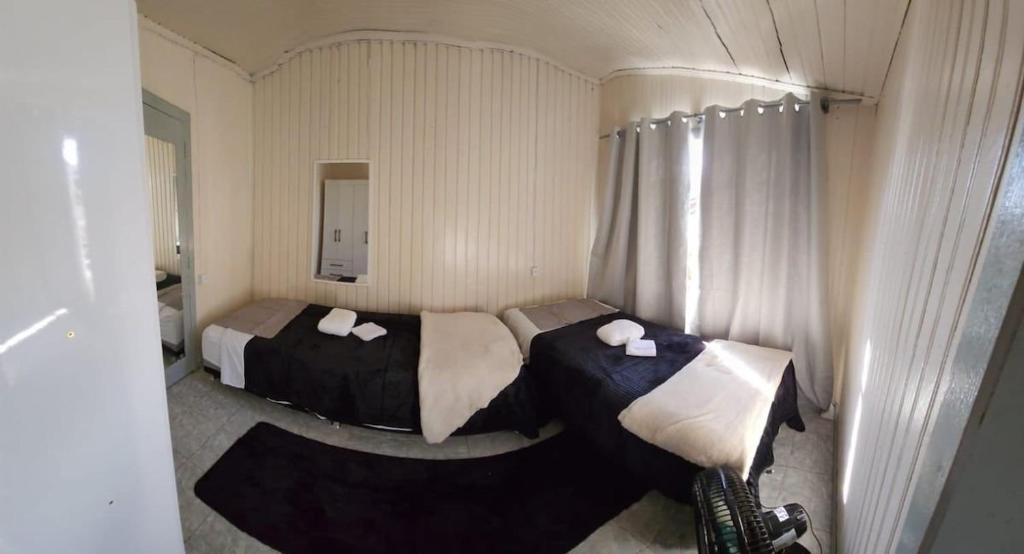 Postel nebo postele na pokoji v ubytování Apartamento PRATICO