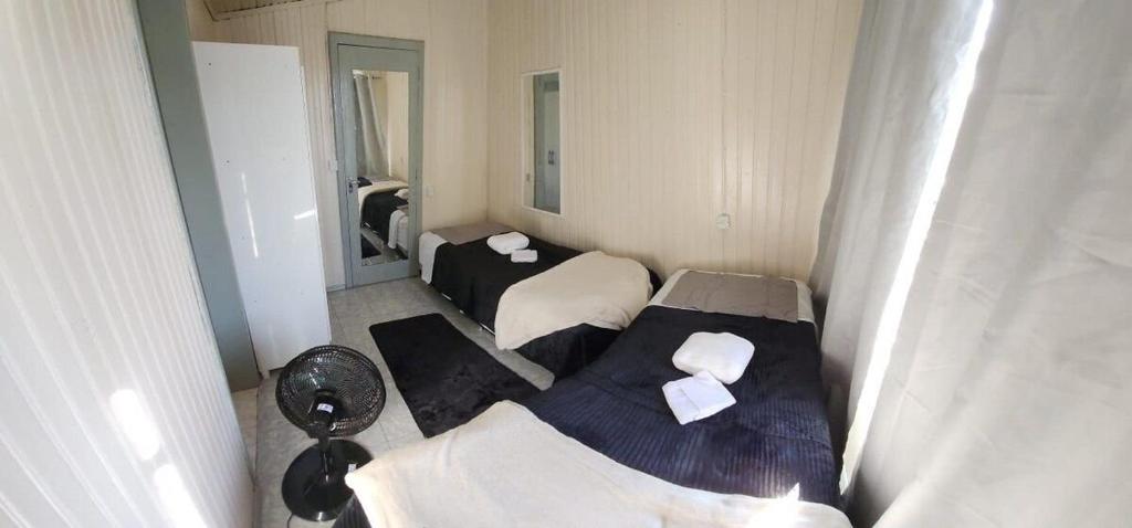 Postel nebo postele na pokoji v ubytování Apartamento PRATICO