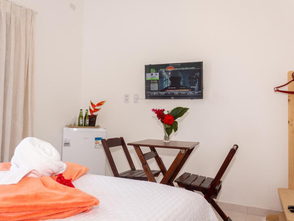 TV a/nebo společenská místnost v ubytování Residencial Santa Fé