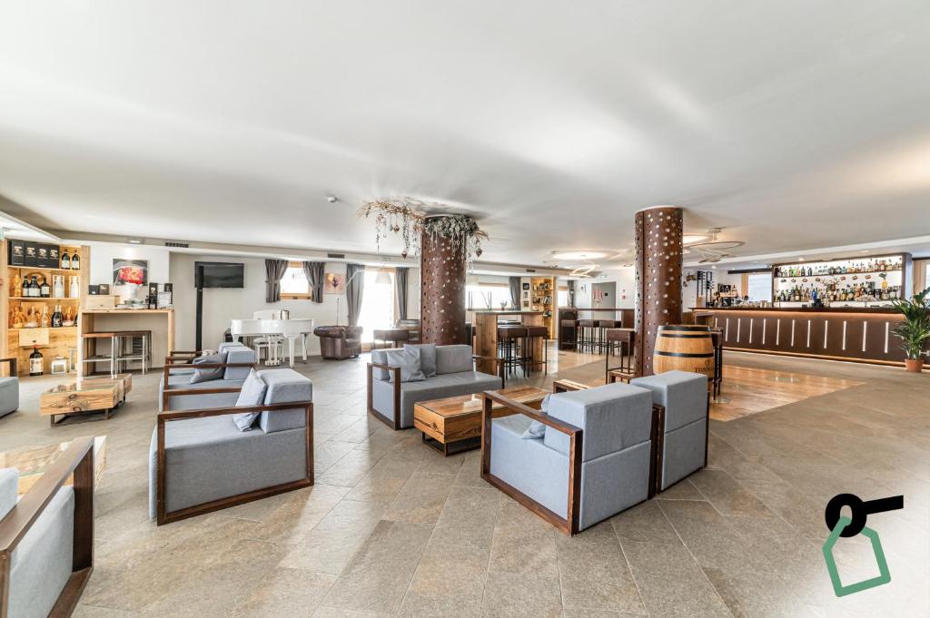 Posezení v ubytování HOTIDAY Room Collection - Cervinia