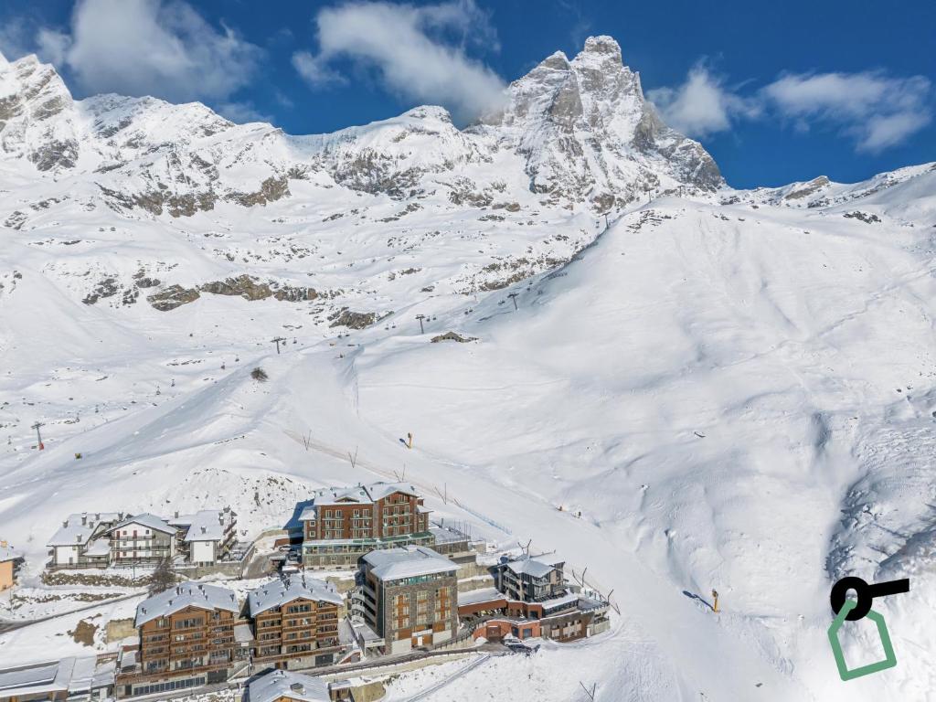 HOTIDAY Room Collection - Cervinia v zimě