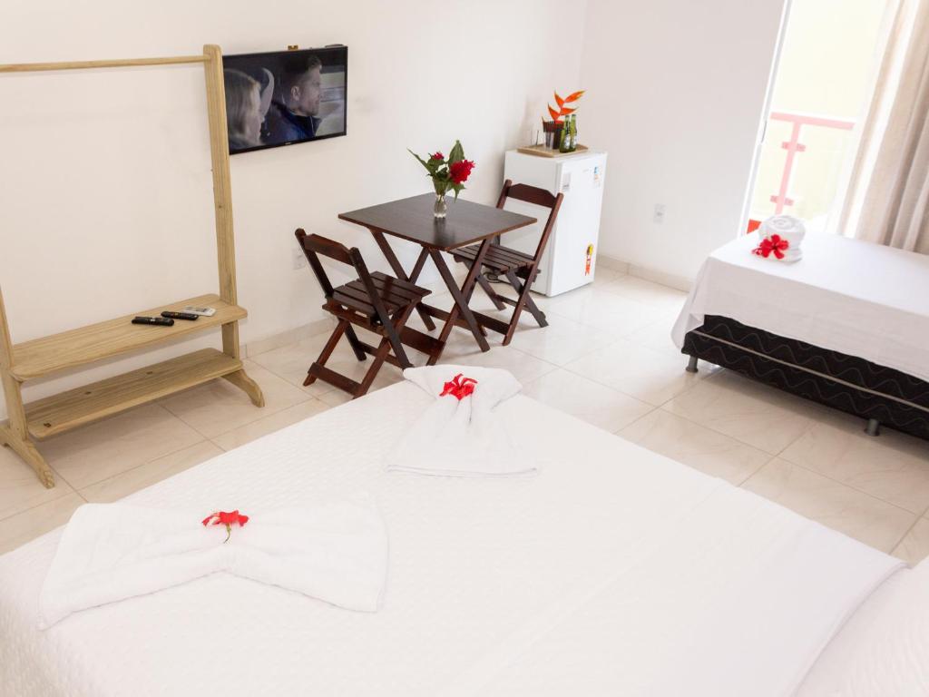 Postel nebo postele na pokoji v ubytování Residencial Santa Fé