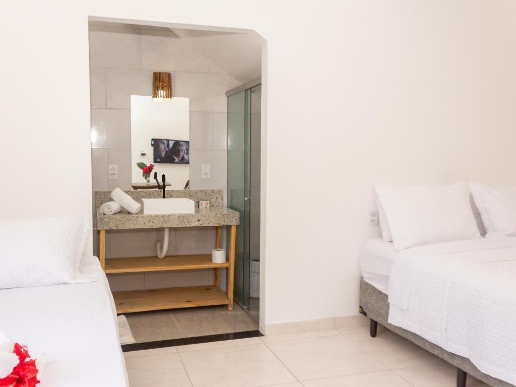 Postel nebo postele na pokoji v ubytování Residencial Santa Fé