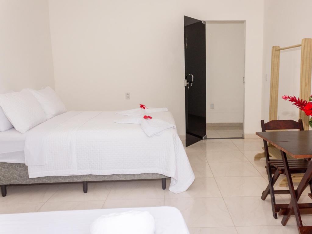 Postel nebo postele na pokoji v ubytování Residencial Santa Fé