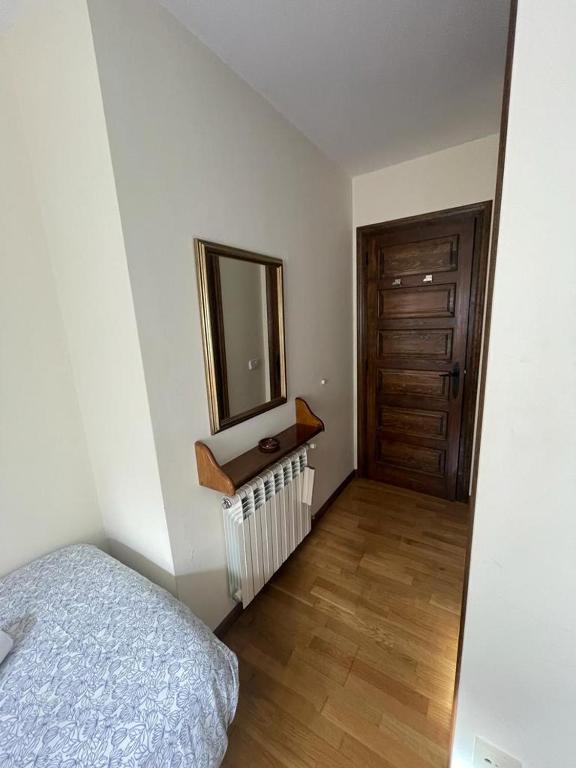 Postel nebo postele na pokoji v ubytování Bonito apartamento Incles by Renttarter