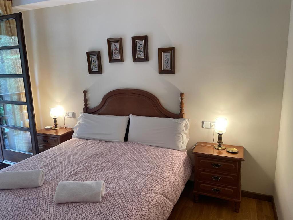 Postel nebo postele na pokoji v ubytování Bonito apartamento Incles by Renttarter