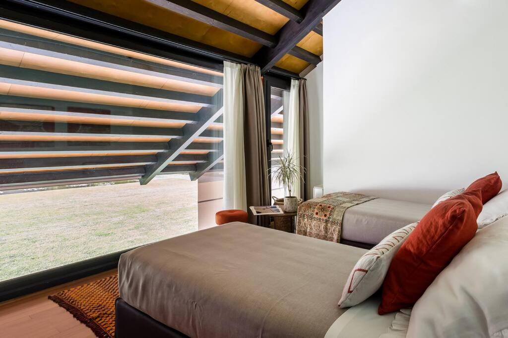 Postel nebo postele na pokoji v ubytování Agriturismo Corte d'acqua