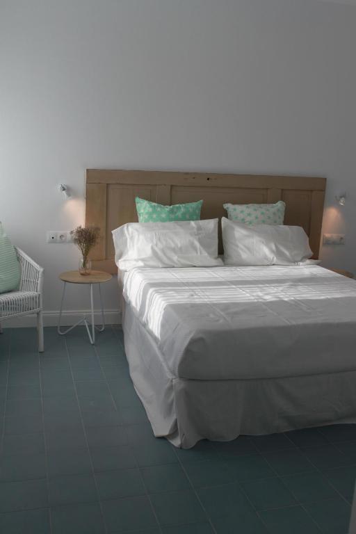 Posteľ alebo postele v izbe v ubytovaní Guadalupe Hotel Boutique