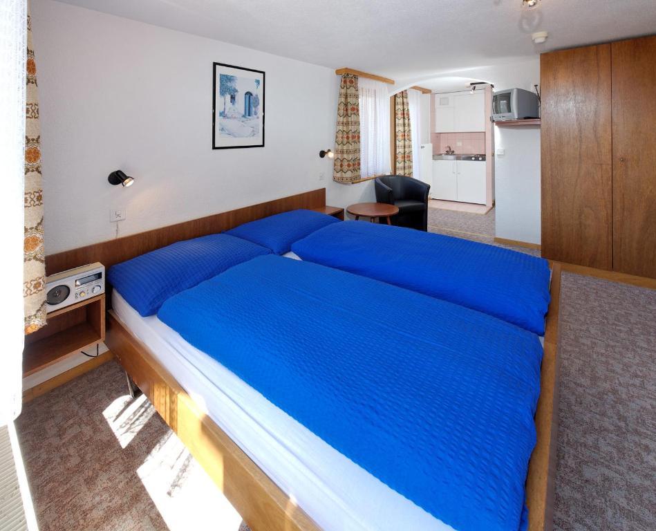 Postel nebo postele na pokoji v ubytování Hotel zum See