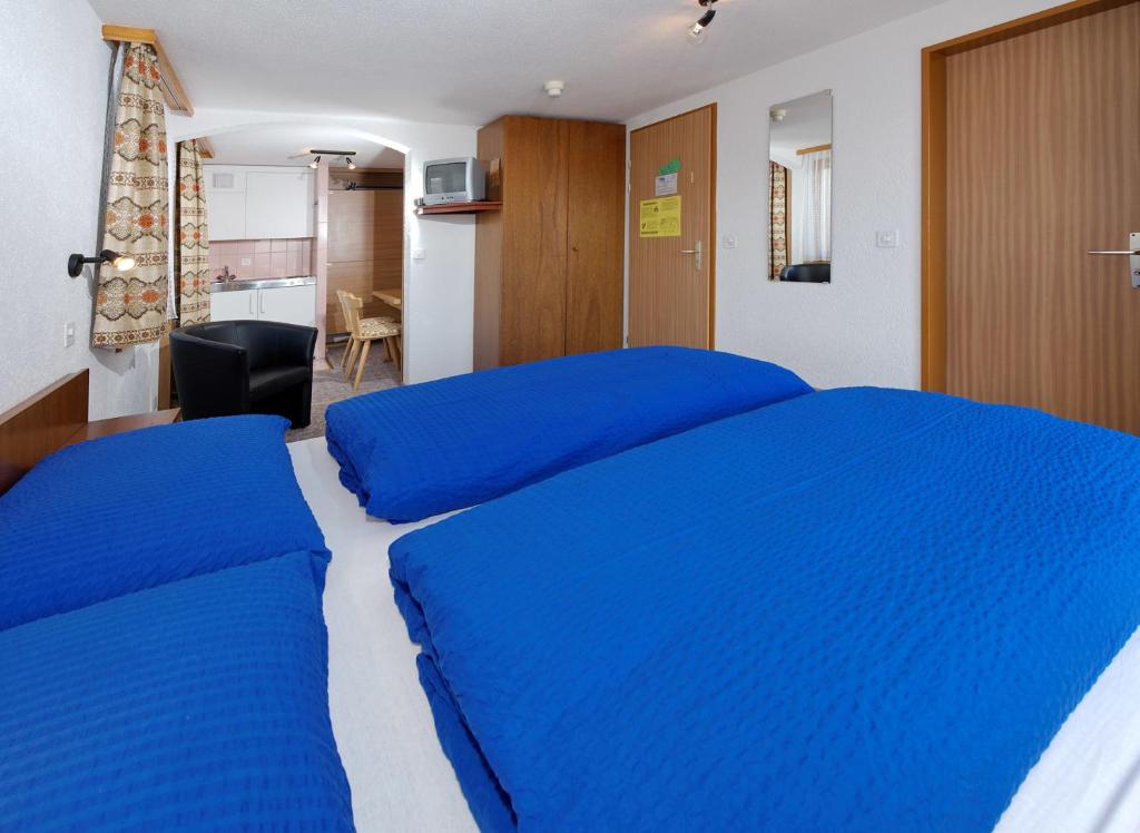 Postel nebo postele na pokoji v ubytování Hotel zum See