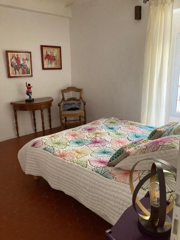 Postel nebo postele na pokoji v ubytování L' ensoleilladou