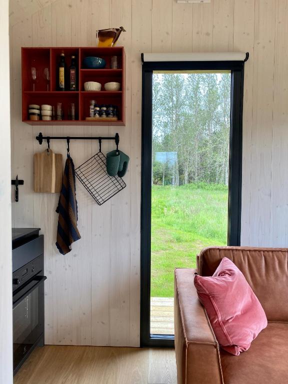 Dapur atau dapur kecil di Bjarmaland Cottages