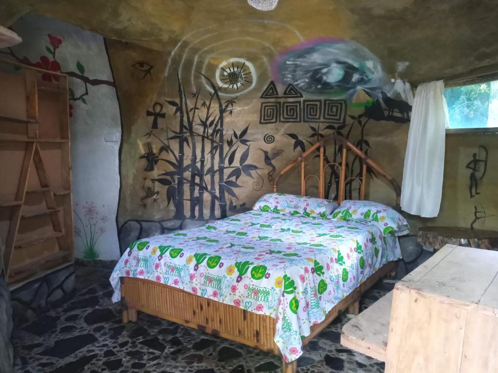 Un ou plusieurs lits dans un hébergement de l'établissement Hospedaje Finca el Mono