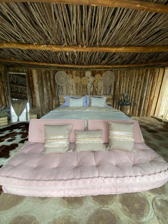 Postel nebo postele na pokoji v ubytování Efren EcoHotel