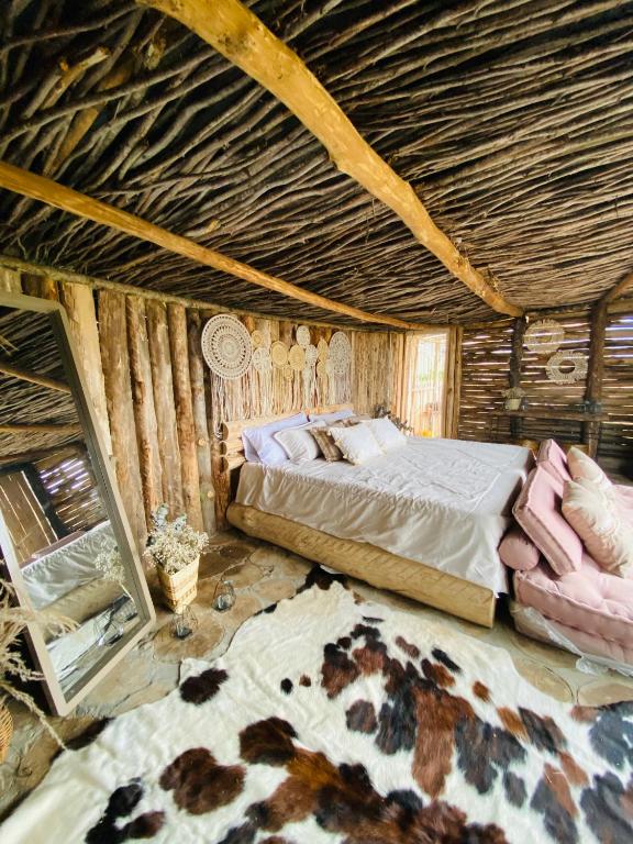 Postel nebo postele na pokoji v ubytování Efren EcoHotel