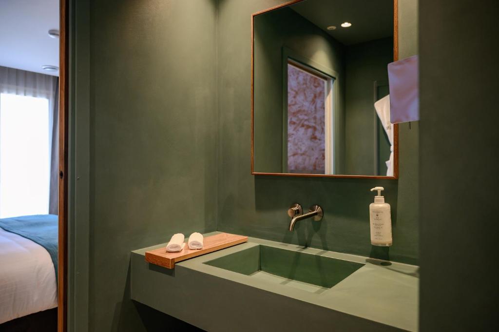 Koupelna v ubytování Sable Bleu Boutique Hotel