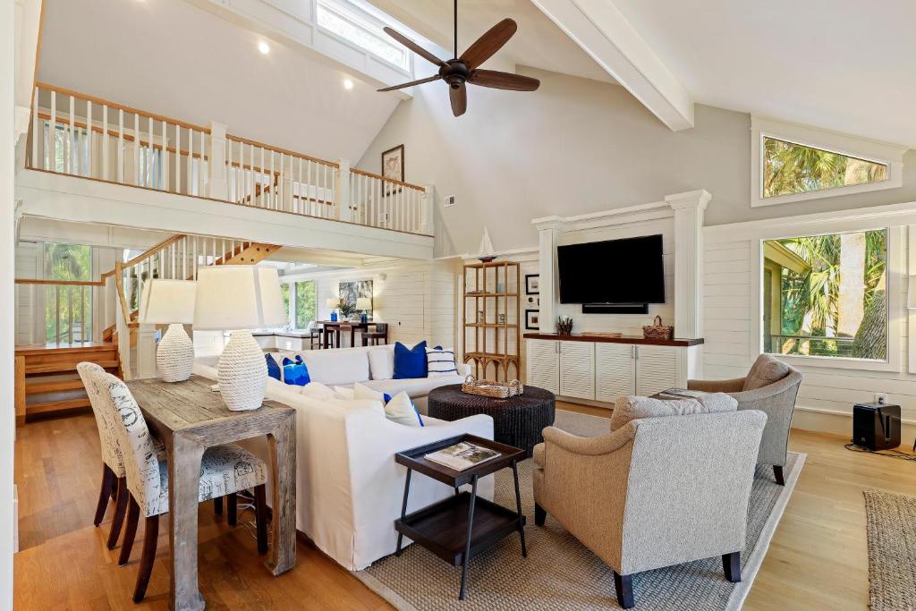 a living room with a couch and a table at 335 Winged Foot in Kiawah Island