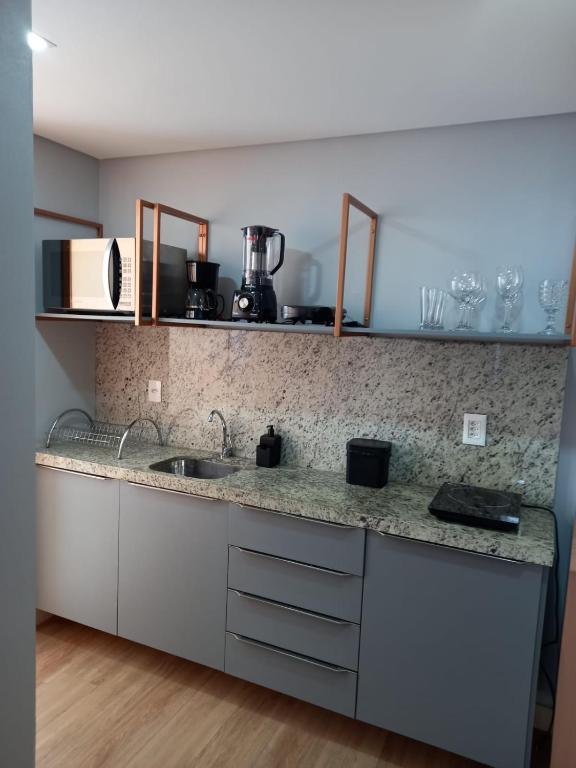 Kuchyň nebo kuchyňský kout v ubytování Manaíra Apart Hotel - Flat 1606
