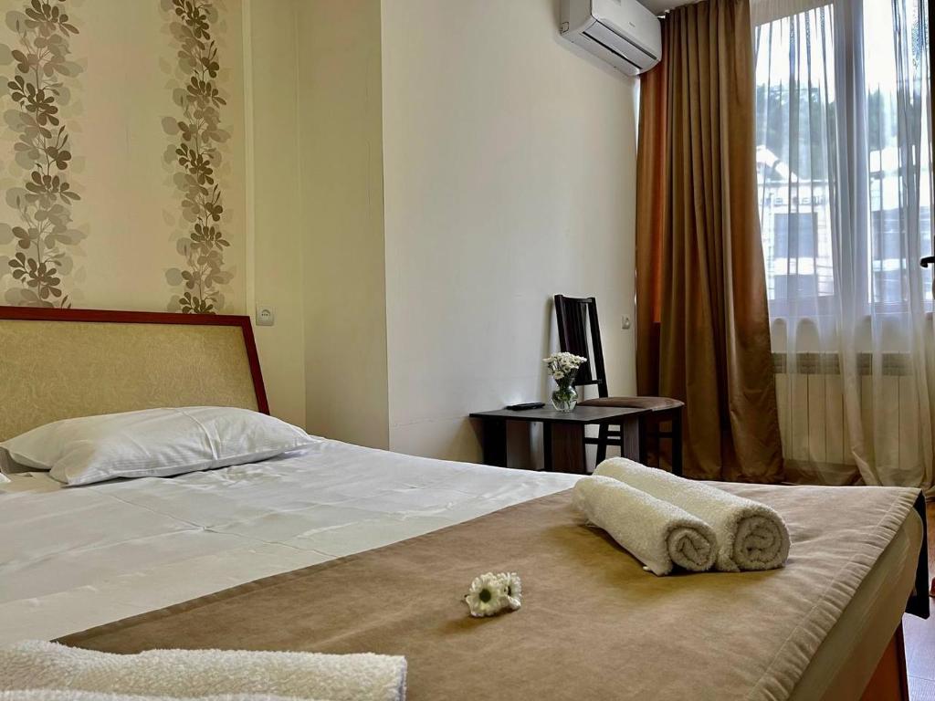 Postel nebo postele na pokoji v ubytování Merien hotel