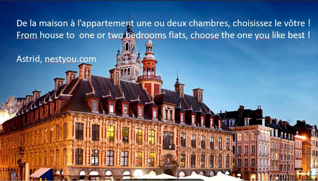 un grand bâtiment avec les mots « être une nation, une griffe d'un hibou » dans l'établissement Coeur Vieux Lille , Bienvenue chez Nestyou, Lille, à Lille