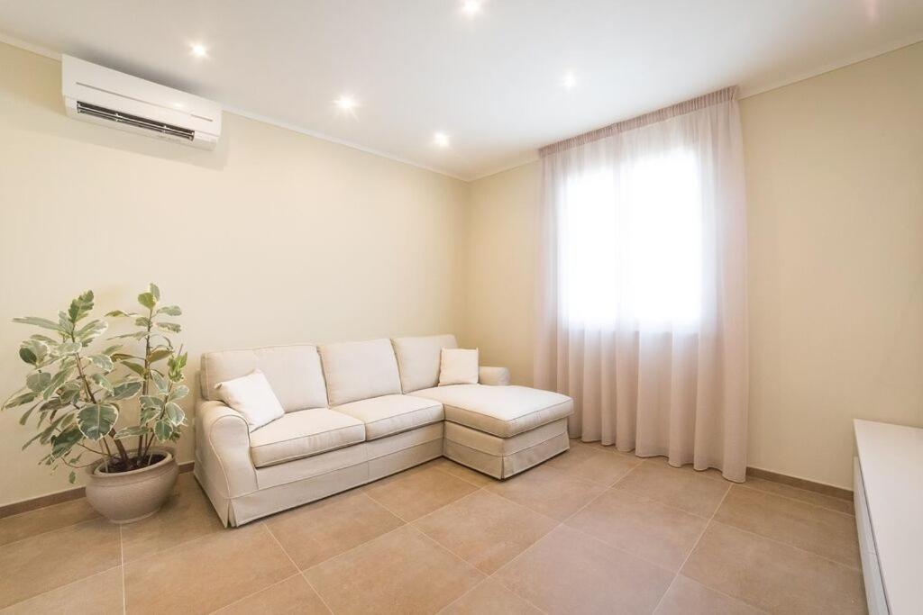 A seating area at Home by Massi