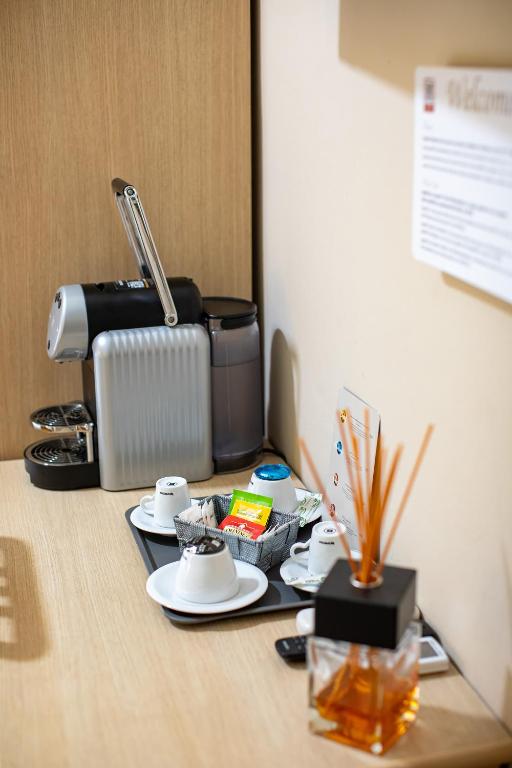 Příslušenství pro přípravu čaje a kávy v ubytování Hotel Novara