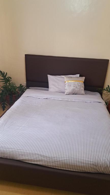 Voodi või voodid majutusasutuse Greenview Homes toas