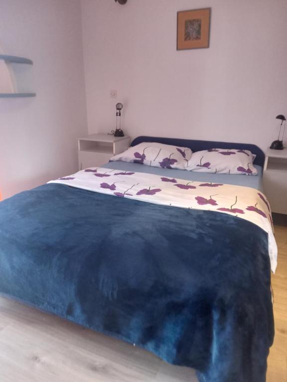 Postel nebo postele na pokoji v ubytování monika
