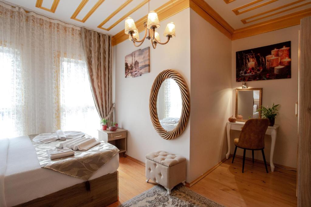 Postel nebo postele na pokoji v ubytování April Story Apart Hotel