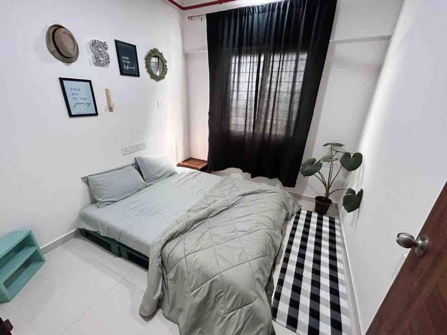 Кровать или кровати в номере LUNA By Namah