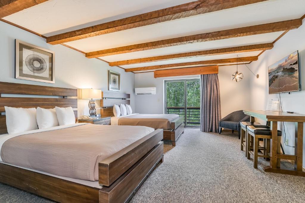 Postel nebo postele na pokoji v ubytování Hotel Vienna