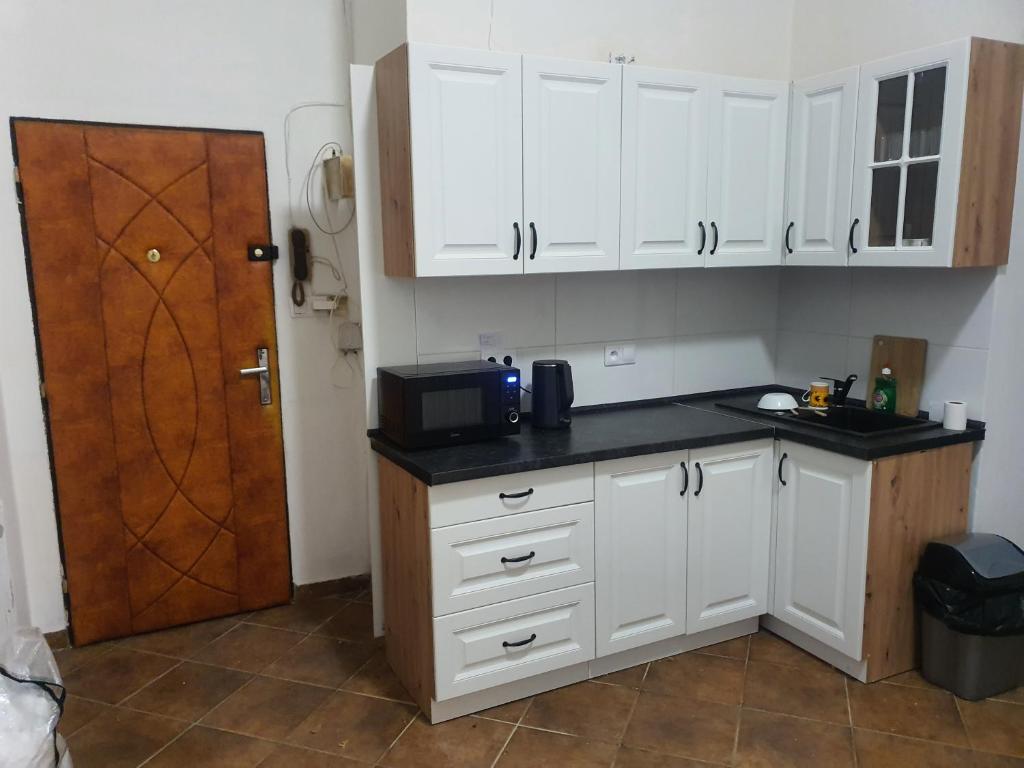 Kuchyň nebo kuchyňský kout v ubytování Hostel Comfort