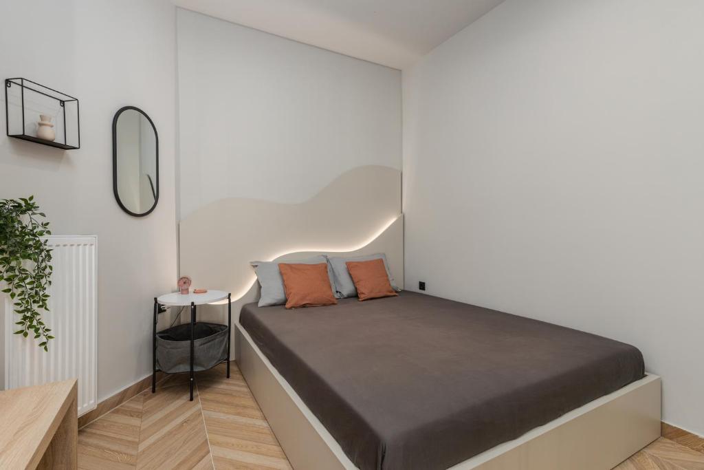 Ένα ή περισσότερα κρεβάτια σε δωμάτιο στο Oasis Diamond Suite