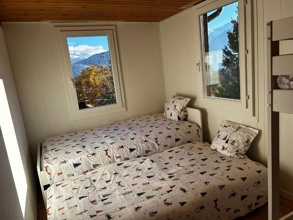 Voodi või voodid majutusasutuse SNOW NEST: Superbe cocon enneigé toas