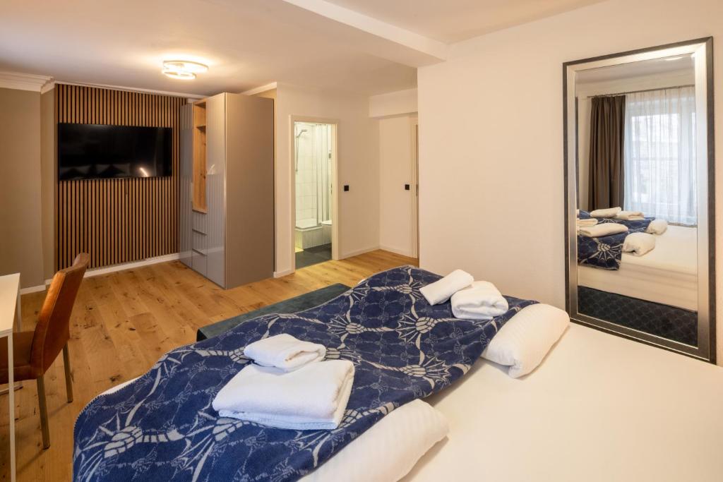 Postel nebo postele na pokoji v ubytování Hotel Schwanen
