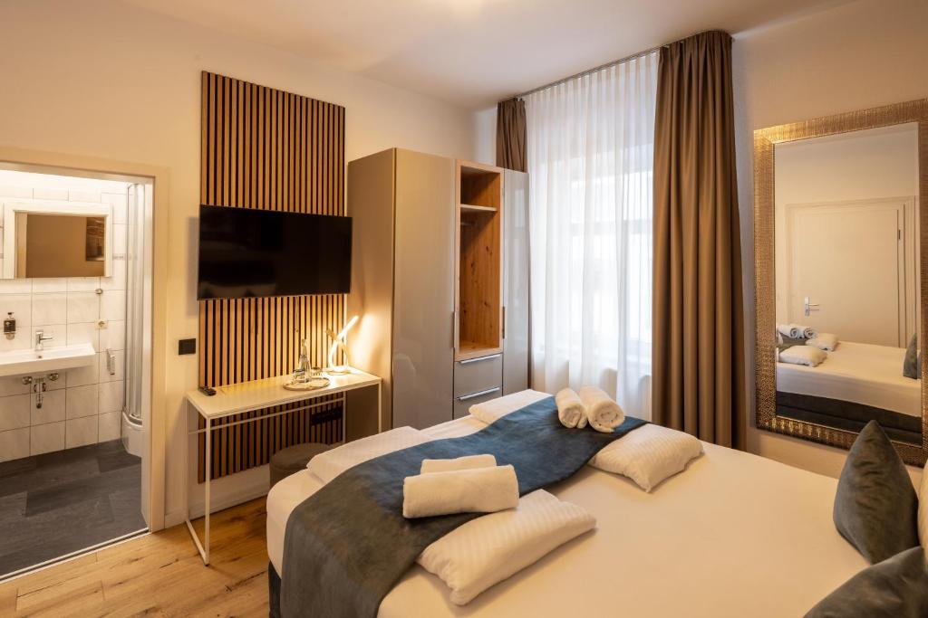 Postel nebo postele na pokoji v ubytování Hotel Schwanen