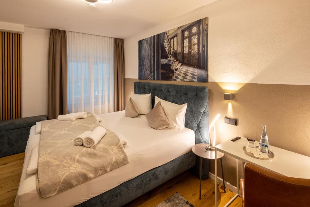Postel nebo postele na pokoji v ubytování Hotel Schwanen