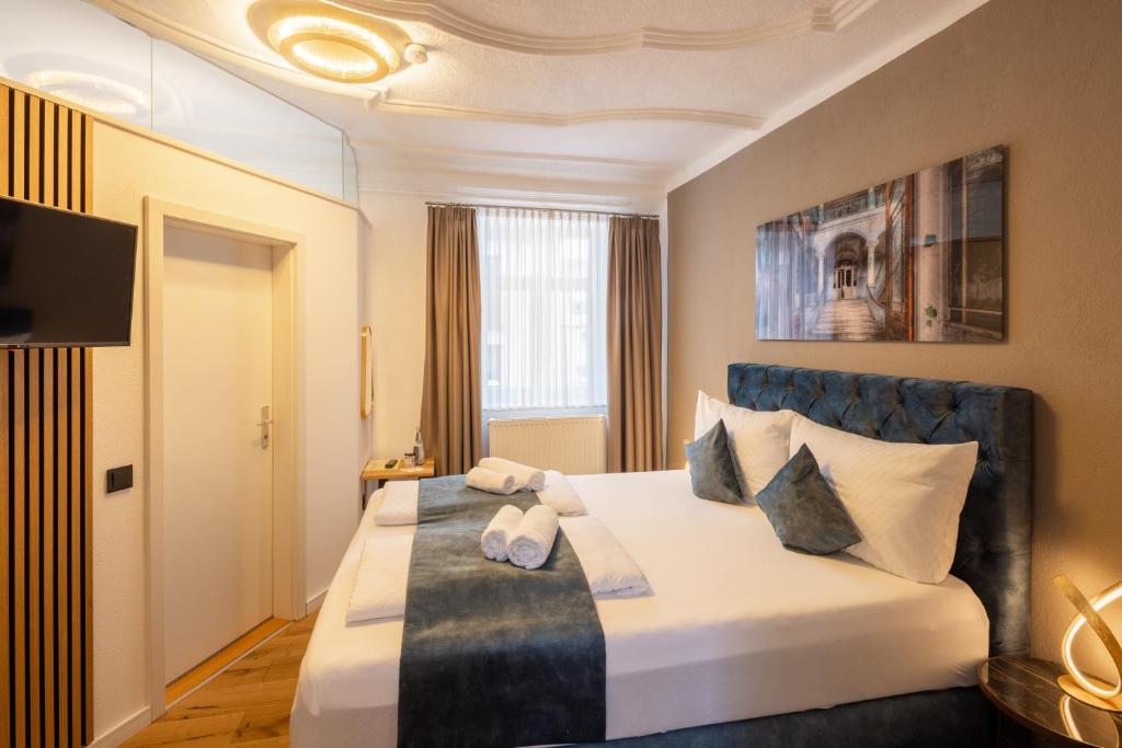 Postel nebo postele na pokoji v ubytování Hotel Schwanen