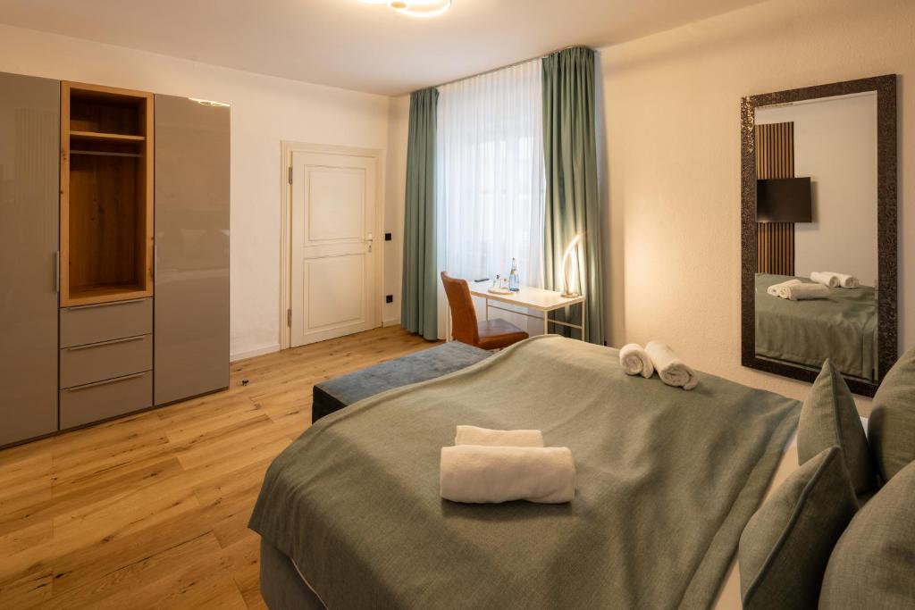 Postel nebo postele na pokoji v ubytování Hotel Schwanen