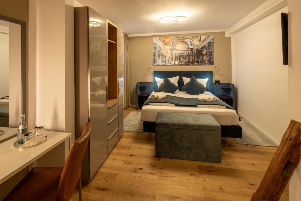 Postel nebo postele na pokoji v ubytování Hotel Schwanen