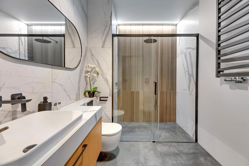 Kúpeľňa v ubytovaní Apartamenty Portova Q4Apartments