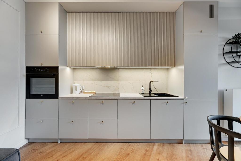 Kuchyňa alebo kuchynka v ubytovaní Apartamenty Portova Q4Apartments